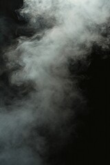 Smoke captured in a close-up shot on a black background. Suitable for various uses