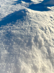 Winter snow. Snow texture Top view of snow. Texture for design. Snowflakes.