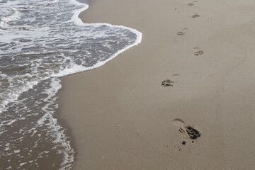 Seashore with footsteps