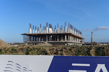machine for pouring concrete at the construction site of a new complex near the sea 8