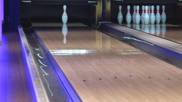 Bowling ball missing the target ninepin losing the game