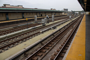Fototapeta na wymiar Bustling train station with a set of railroad tracks in New York, United States