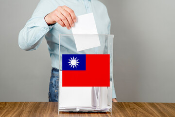 Taiwan flag, Republic of China ROC Ballot box with ballots. Elections, voting, referendum,...