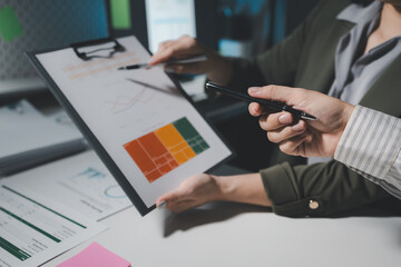 Work together as a team business persons on meeting in the office, colleagues discussing strategy at office, Explaining the report at the meeting, Collaborate to solve problems in the meeting room,