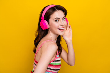 Portrait of good mood cute woman with piercing wear knit tank touch earphones enjoy sound isolated...