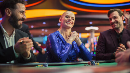 High-Stakes Poker Championship in Casino Won by Beautiful Lady. Glamorous Players Place Bets, Reveal Cards. Gorgeous Successful Young Woman Triumphs, Celebrating Her Jackpot Win. 