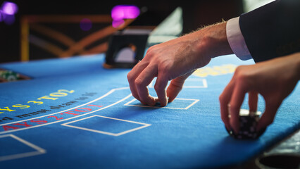 Close Up on Casino Baccarat Gambling Table: Anonymous Croupier Dealing Playing Cards on a Blackjack...