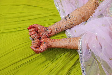 Henna mehndi in closed hand