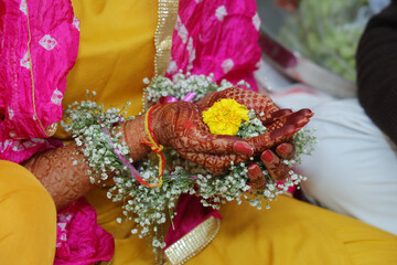 Closeup of flower in bridal hand