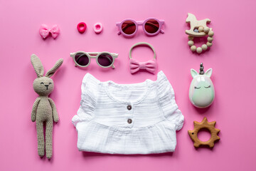 Kids wear flat lay - dress for baby girl with accessories, top view