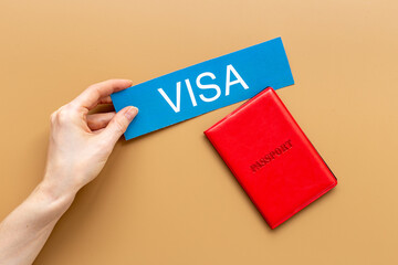 Red passport with approved visa, vacation trip concept