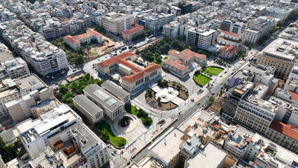 Aerial drone photo of iconic neoclassic University, Academy and public Library of Athens, Athens historic center, Attica, Greece   