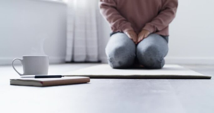 Person, home and yoga mat for exercise, wellness and health, done and zen. Peaceful, mind and holistic in class, mindfulness and breath for body, healthy and activity in house, wellbeing or alone