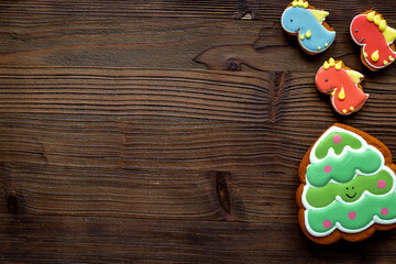Christmas cookies in the shape of a dragons 2024 symbol. Happy New Year background