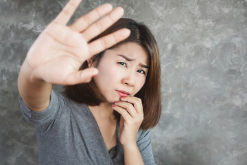 paranoid delusion with Asian woman feeling fear and panic attack