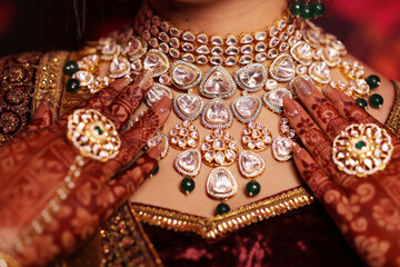Closeup of kundan necklace wore by indian bride