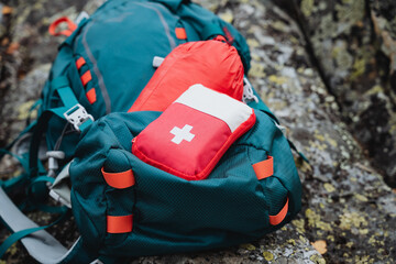 First aid kit close-up, hiker's kit, hiking first aid kit. Trekking equipment.