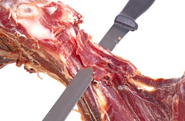 Leg of spanish jamon serrano, dry cured ham, on a white background