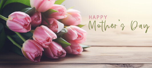 Happy Mother's Day celebration holiday greeting card with text - Bunch of flowers, bouquet of pink tulips on rustic wooden table