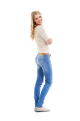Fototapeta premium Woman, portrait and arms crossed or happy in studio with empowerment, positive mindset or confidence. Model, person and smile with casual outfit, trendy clothes or mock up space on white background