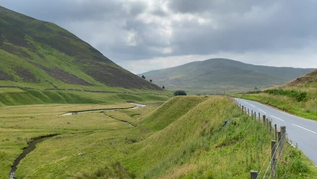 On the road along the Loch Lurgainn, Scottland. It is a large deep loch located north along the west coast from Ullapool, Scotland
