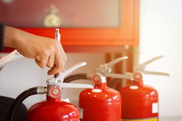 Naklejka premium Engineer check fire suppression system,check fire extinguisher tank in the fire control room for safety
