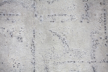 Dirty rough surface texture of sand screed cement, old gray concrete wall for background with uneven stains and tiny holes. Background image for your creative design or illustrations.