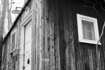 Rustic outhouse in the woods 