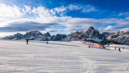 The Three Peaks (Drei Zinnen) ski resort in the UNESCO World Heritage site Dolomites in Italy.  - obrazy, fototapety, plakaty