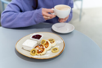 Morning meal with cheese pancake and jam. Gourmet and healthy breakfast