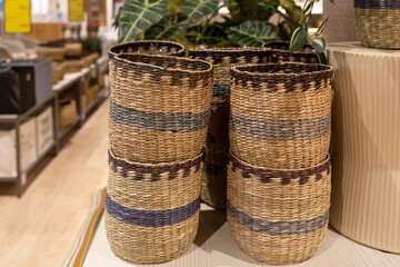 Wicker baskets for the home on a store display.