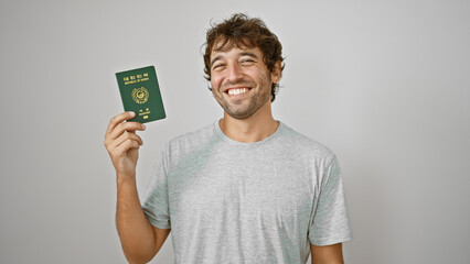 Young korean man holding his passport, smiling with confidence over isolated white background,...