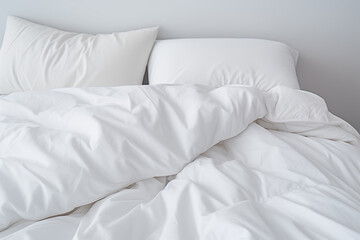 Fototapeta na wymiar White blanket on the bed