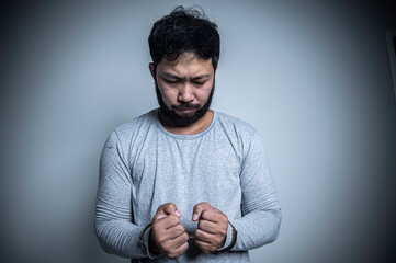 Asian handsome man angry on white background,Portrait of young Stress male concept,Bad mood after...