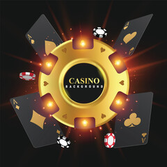 Four black poker cards with gold suit and casino gold gambling chip