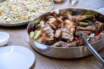 Chicken and rice on dinner table well prepared and served