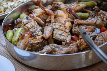 Chicken and rice on dinner table well prepared and served