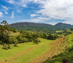 Tiradentes town, Minas Gerais, Brazil, below the cliffs of Serra de São José (St. Joseph) range