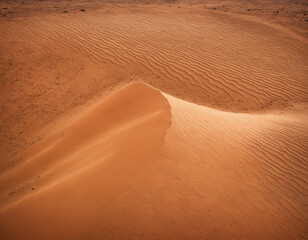 Fototapeta na wymiar Top view of dunes in the desert with copy space