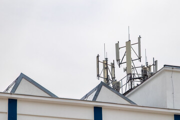 Telecommunications equipment on the roof of an industrial building.