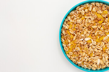Image above of a bowl of puffed wheat and cornflakes