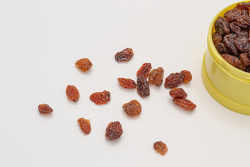Raisins on a white background