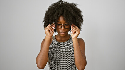 African american woman business worker with serious face taking glasses off over isolated white...
