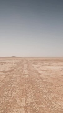 driving in sahara desert, morocco in vertical