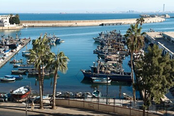 A view of the port, the Mediterranean Sea and the historic Casbah district in Algiers, the capital...