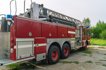 A fire truck for the delivery of firefighters to the place of fire and the supply of extinguishing agent for extinguishing. Equipment for rescuing people in case of fire. Emergency rescue service.