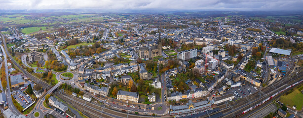 Aerial around the city Arlon in Belgium on a cloudy afternoon in later fall.