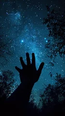 Foto op Plexiglas Hand Silhouetted Against the Night Sky, Reaching Upward Amidst a Scattering of Stars © Lila Patel