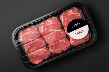 Sealable black plastic tray of fresh raw meat with label texting (have to texting edit) - obrazy, fototapety, plakaty