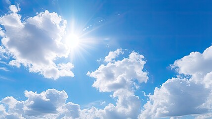 Close-up view of a fluffy cloud in a clear blue sky, with the sun's rays softly shining through it 